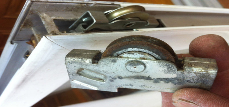 screen door roller repair in Tamiami